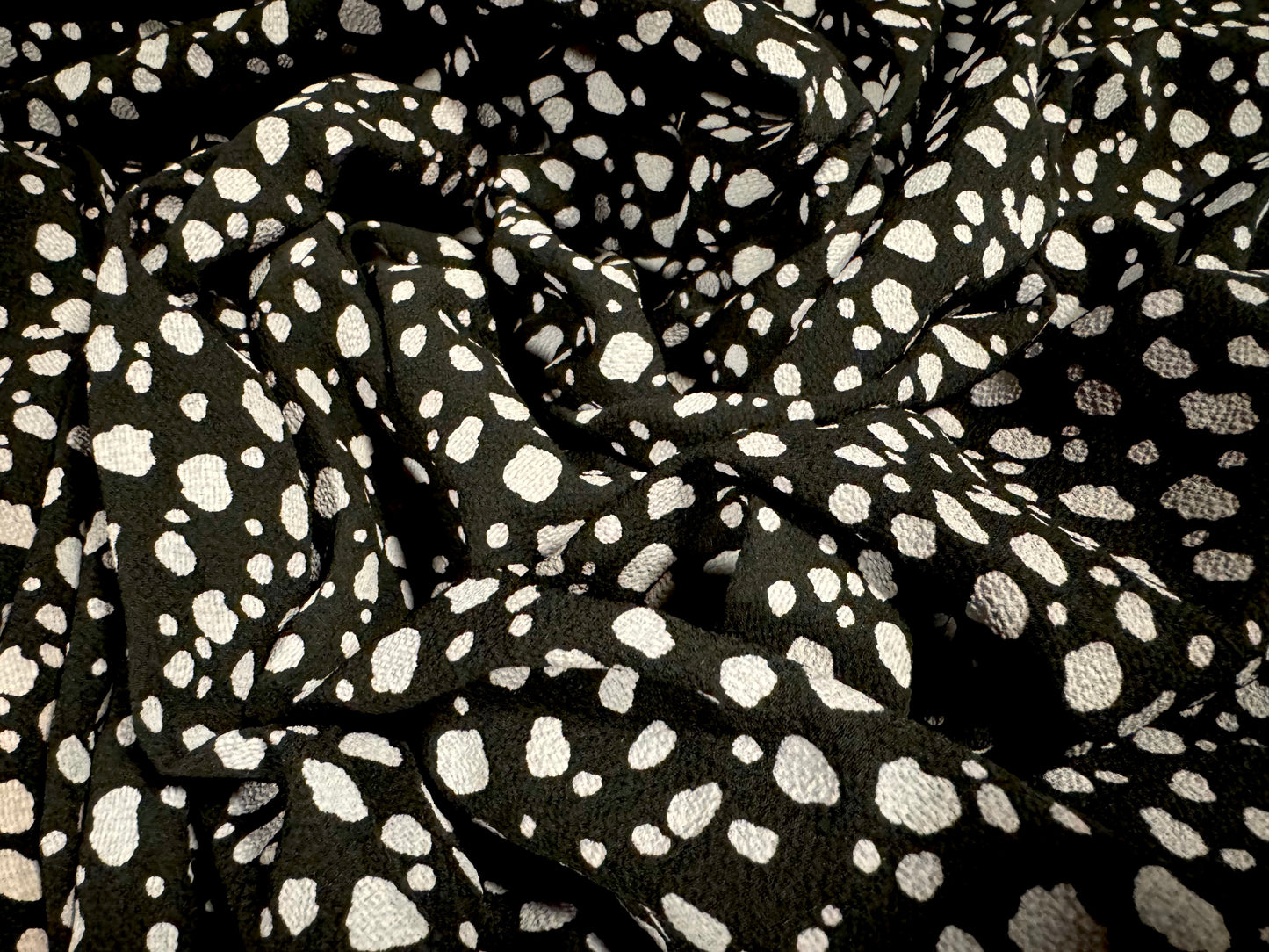 Pebble crepe woven dress fabric, per mere - Dalmatian animal print - black & putty