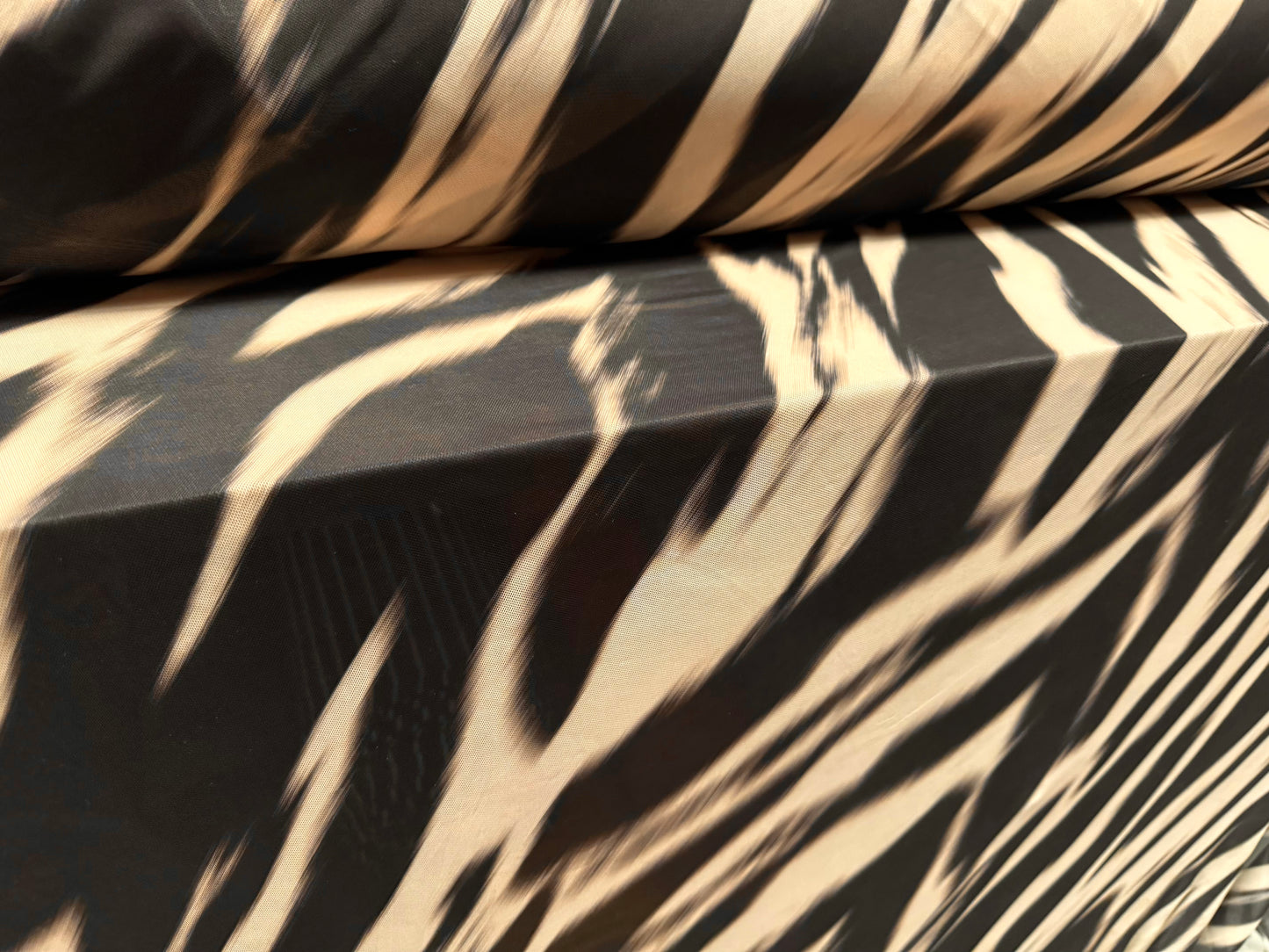 Power mesh net stretch spandex fabric, per metre - zebra smudge print - cream & black