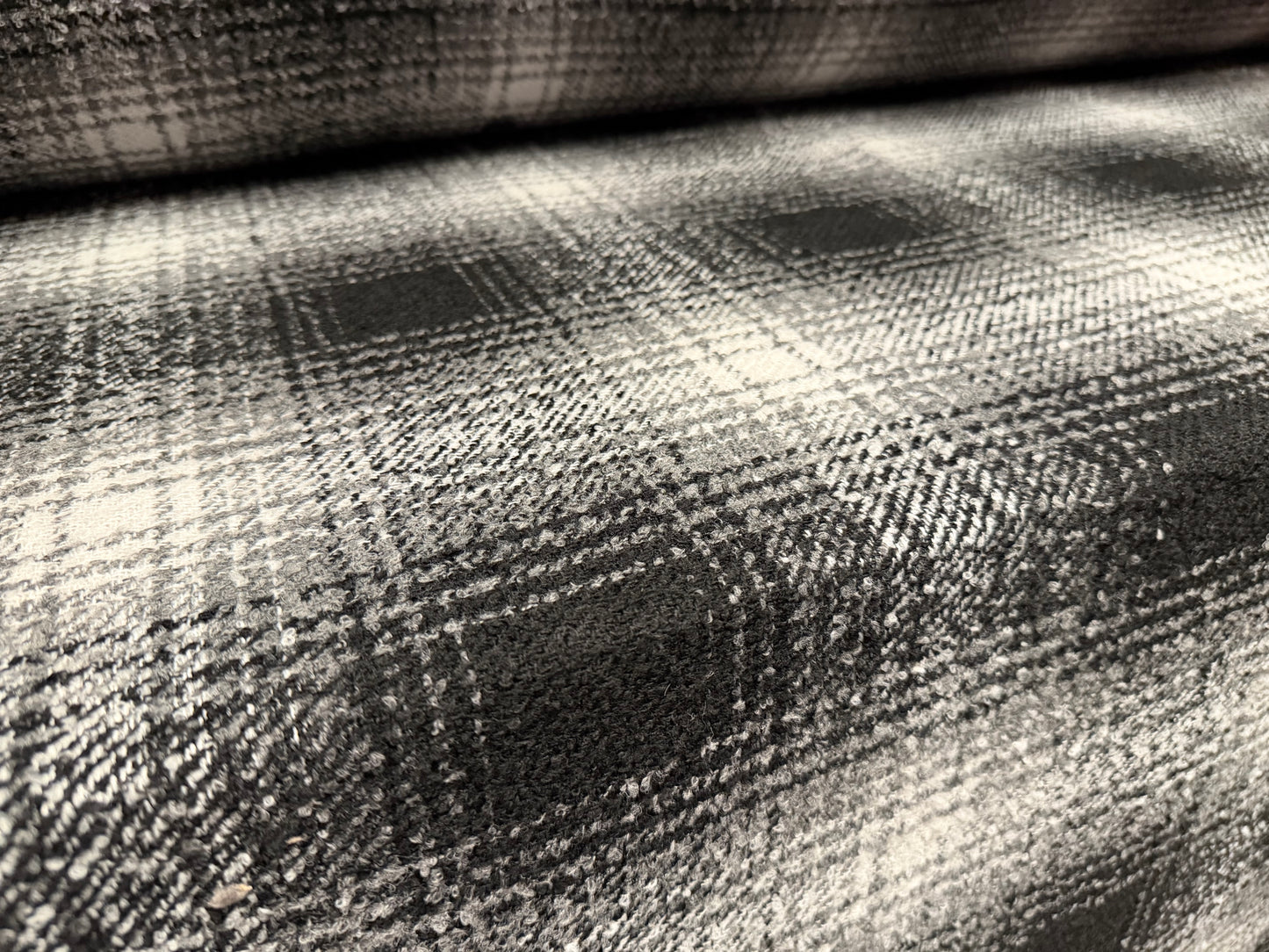 Wool bouclé fabric, per metre - checkered - black & grey