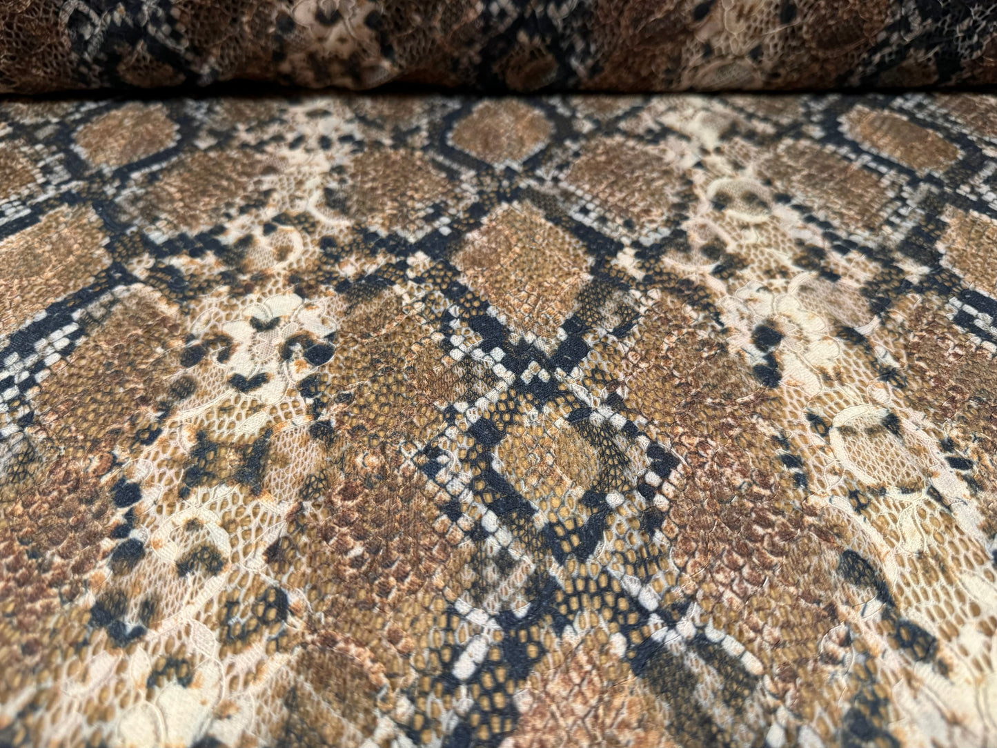 Stretch lace dress fabric with scalloped selvedge, per metre - snakeskin animal print - brown & nude