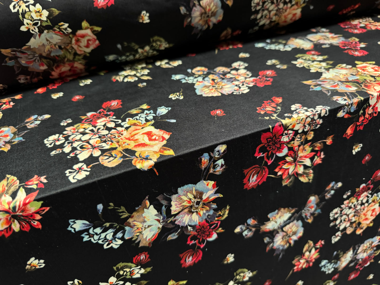 Soft touch stretch spandex single jersey fabric, per metre - flourish print - black with multicolour flowers