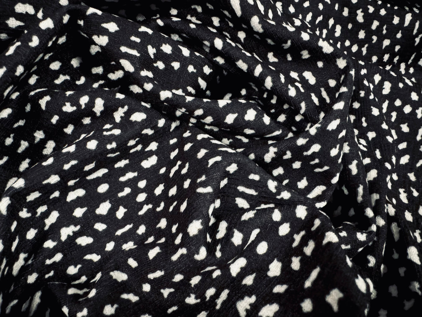 Straw cloth textured stretch double jersey fabric, per metre - asteroid print - black & white