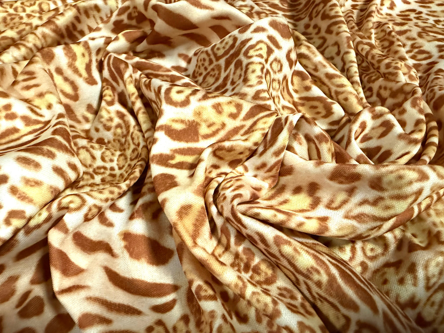 Single jersey fashion fabric, per metre - stylised animal print - gold