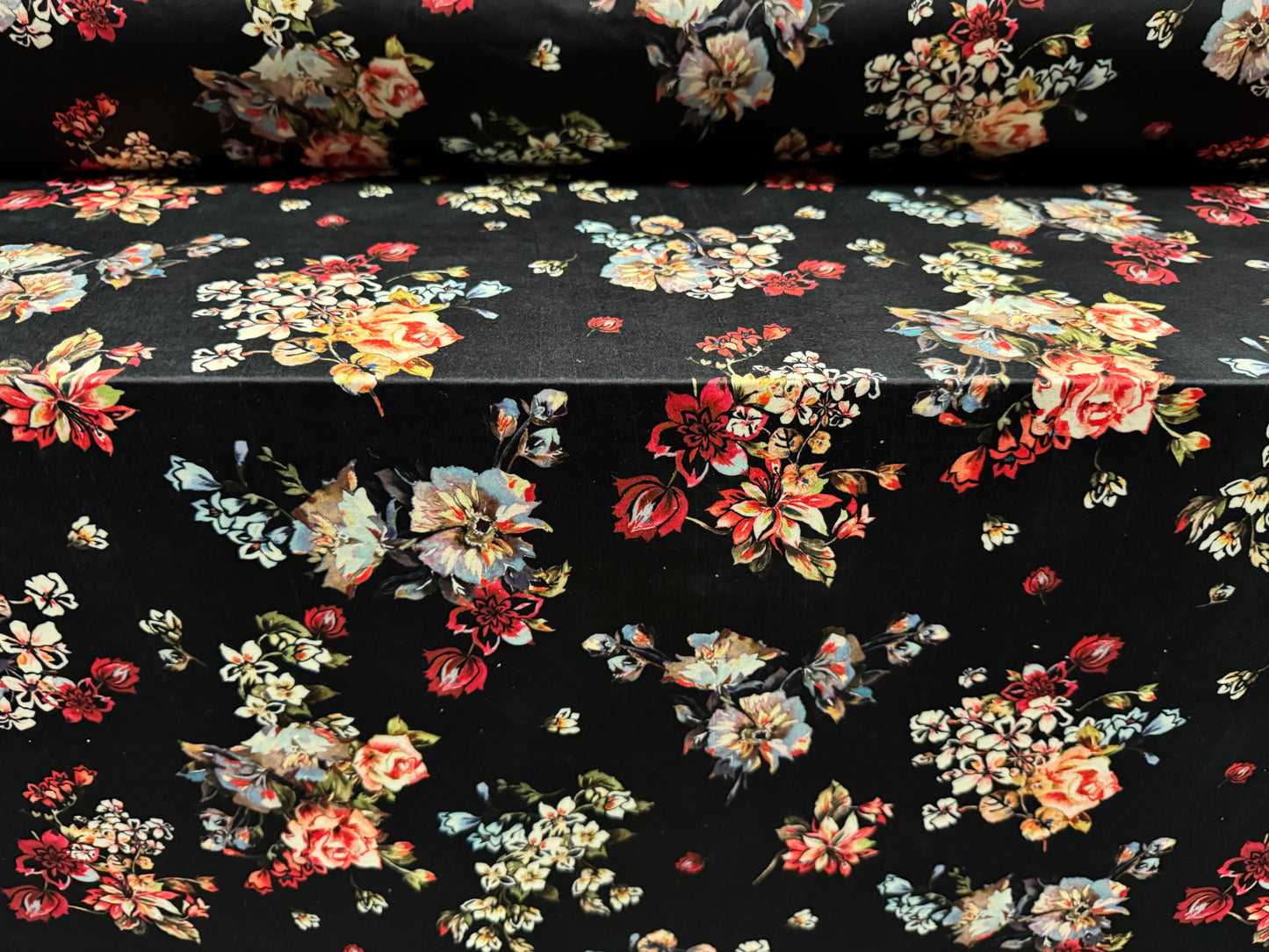 Soft touch stretch spandex single jersey fabric, per metre - flourish print - black with multicolour flowers