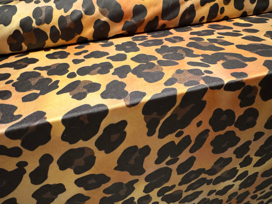 Soft touch stretch spandex single jersey fabric, per metre - stylised leopard print - gold & amber