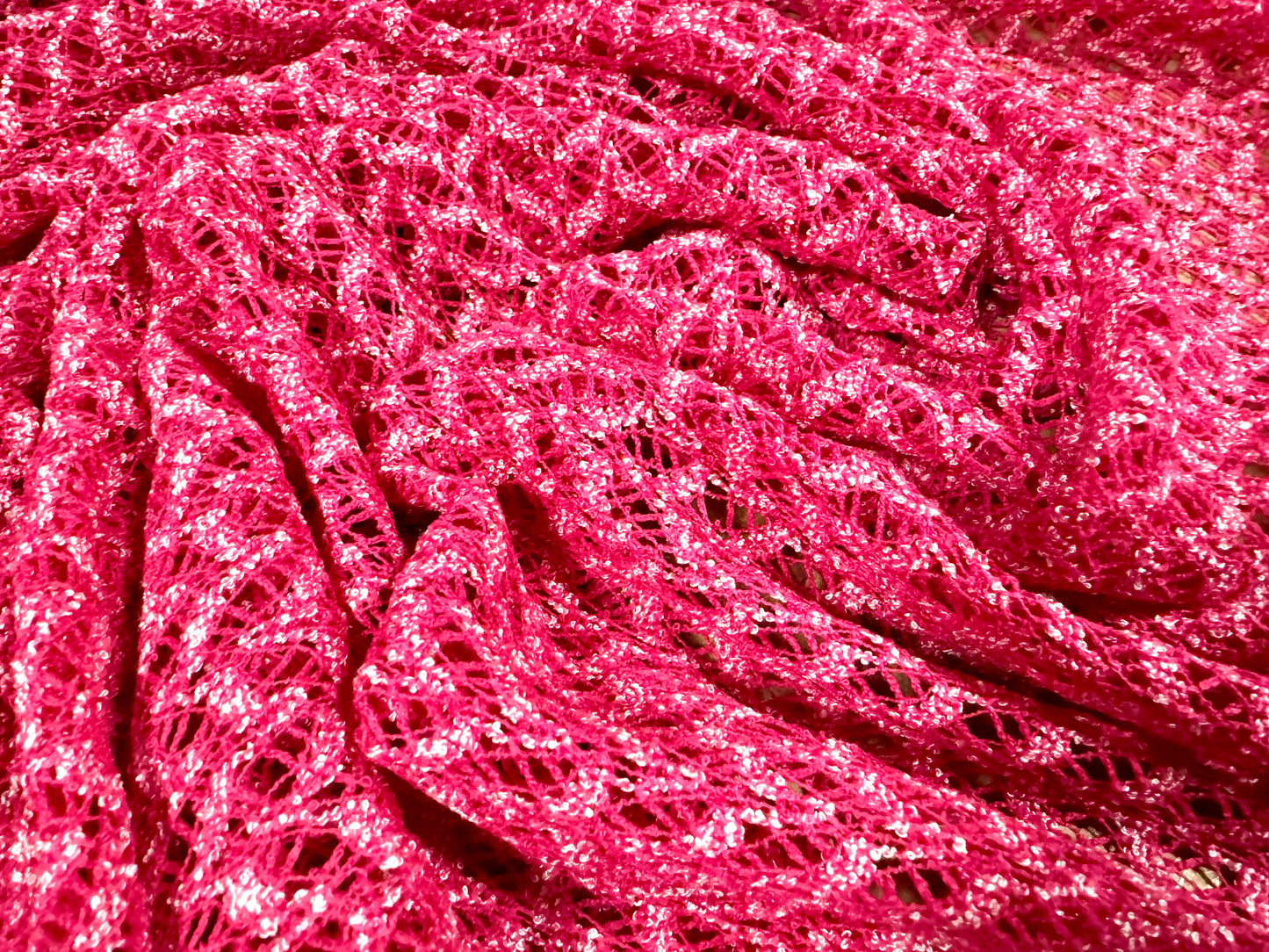 Soft crochet knit fabric, per metre - abstract pattern - cerise pink melange