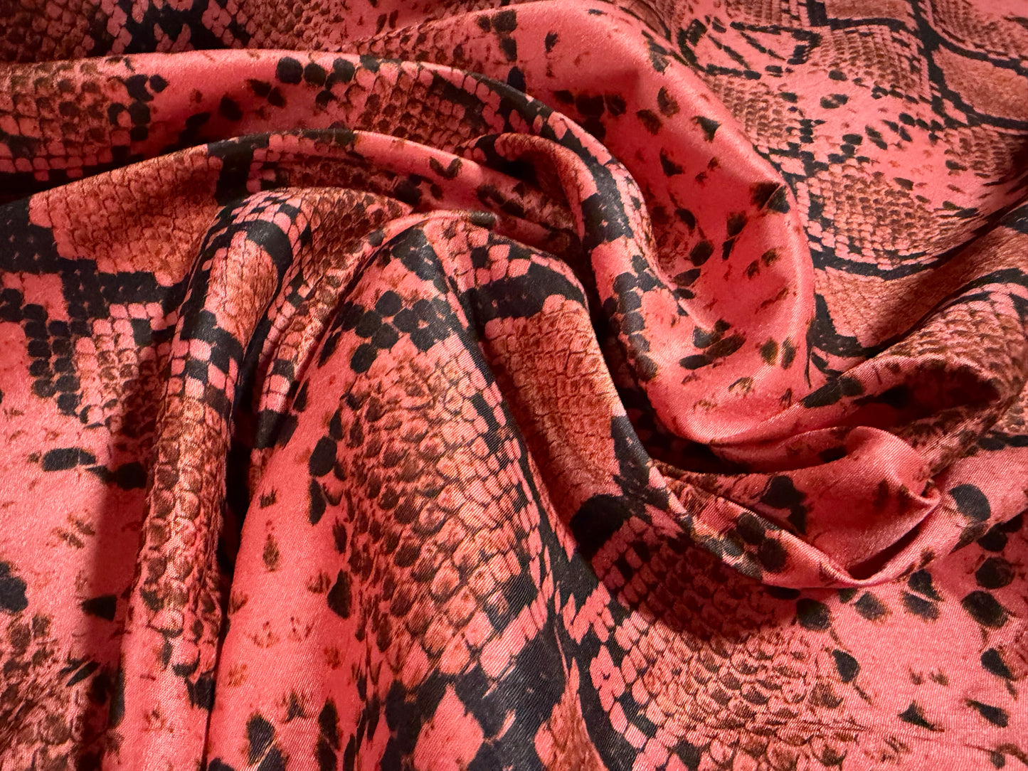 Shantung satin faux silk woven dress fabric, per metre - snakeskin print - coral