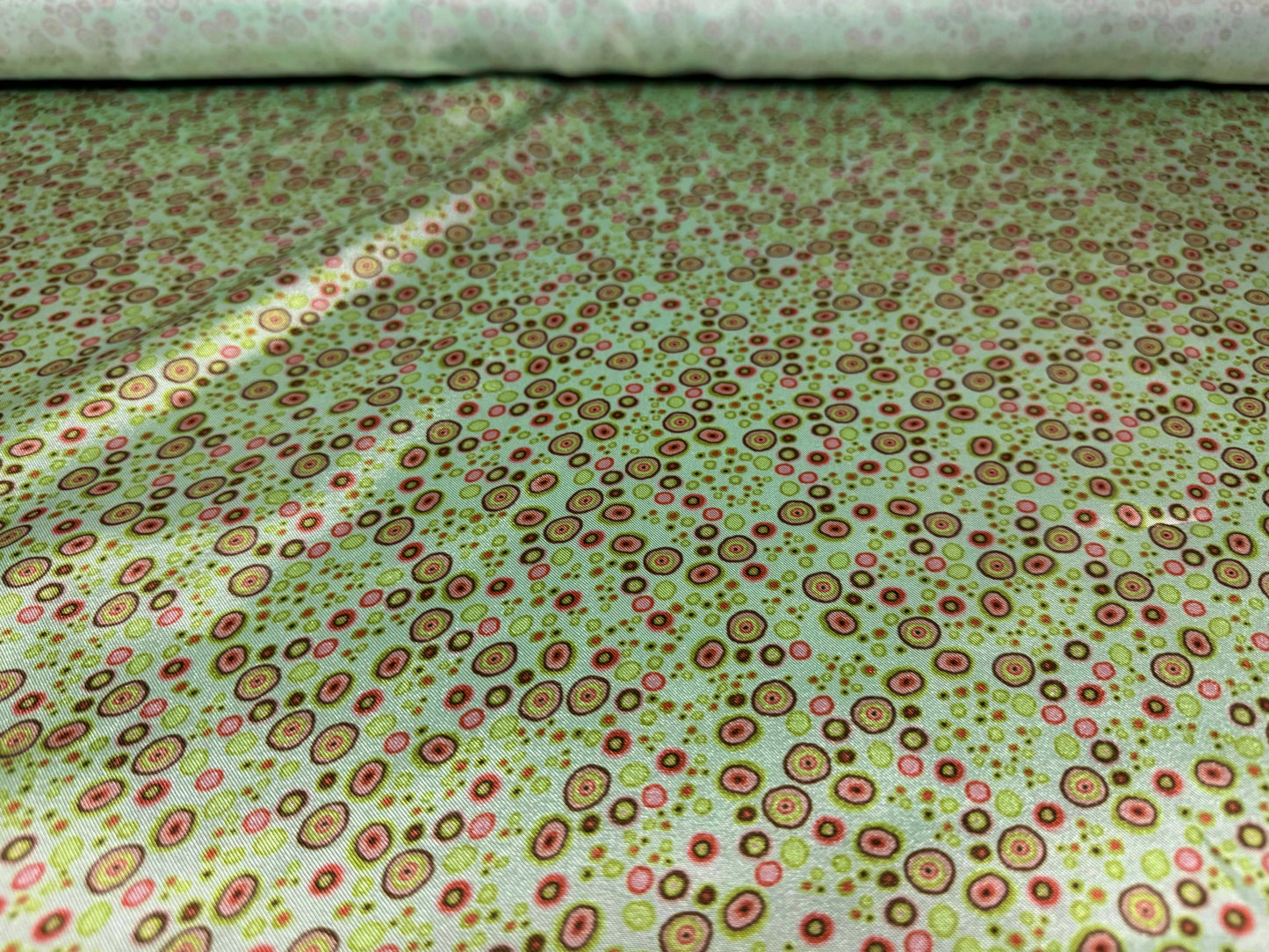 Silky satin woven dress fabric, per metre - circles print - aqua