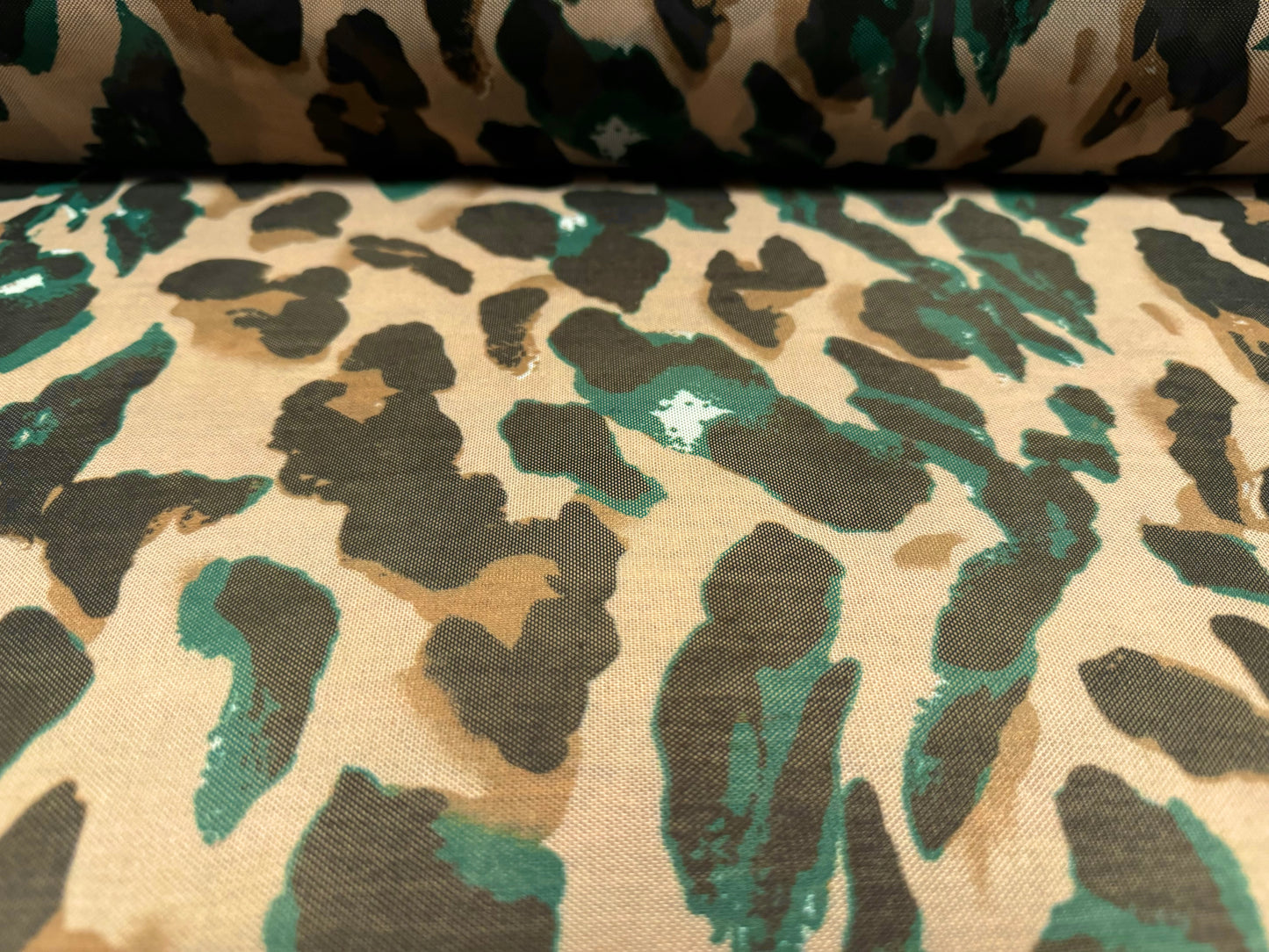 Power mesh net stretch spandex fabric, per metre - stylised cheetah print - sand & emerald green