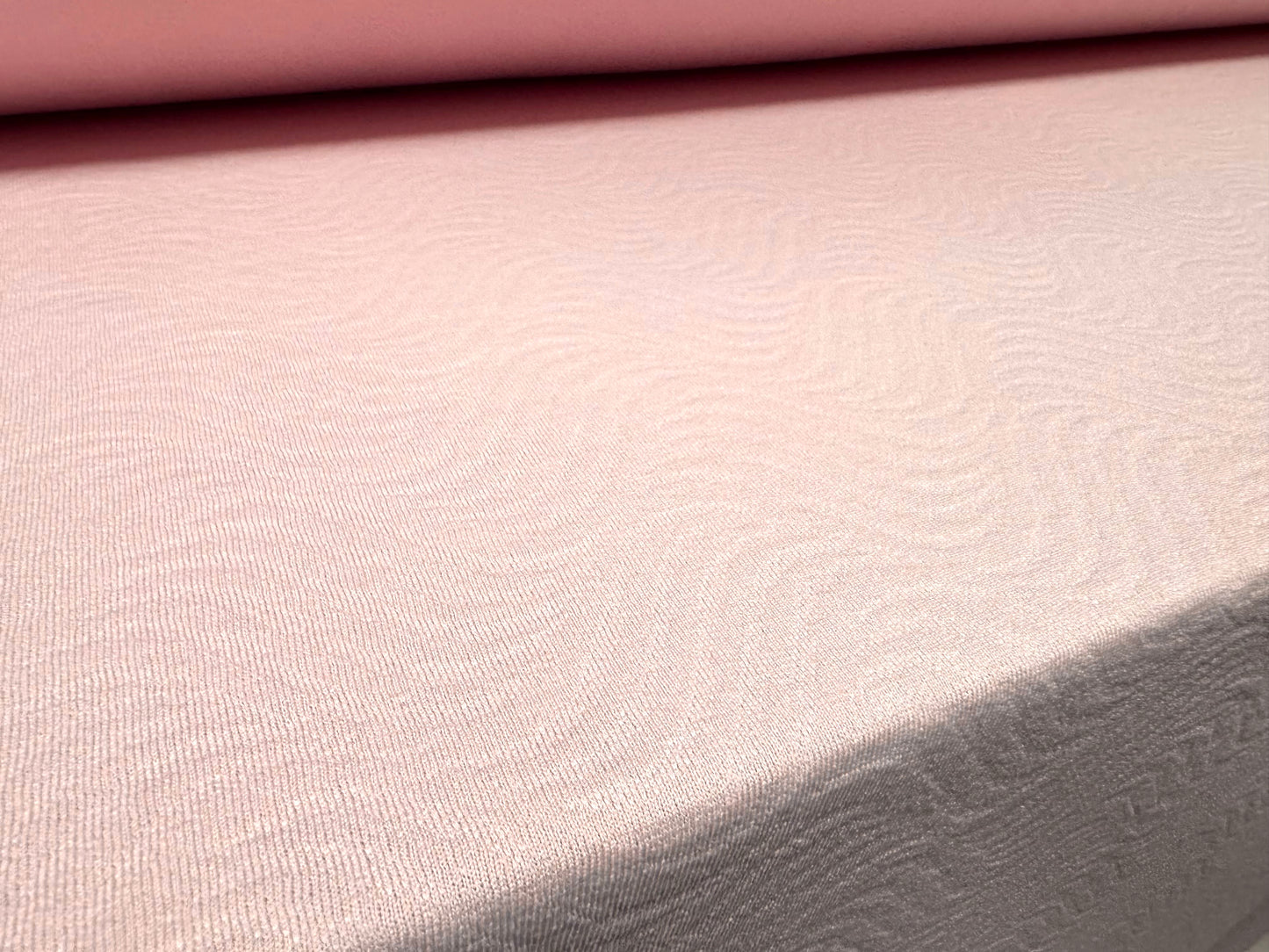 Embossed scuba stretch spandex double jersey fabric, per metre - wave design - pastel pink