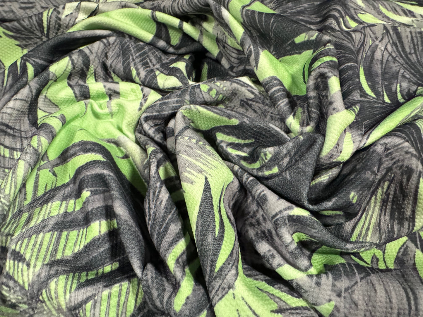 Stretch double jersey piqué fabric, per metre - Palm Tree Fronds print - green & grey