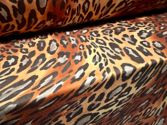 Stretch spandex interlock jersey fabric, per metre - animal swirl print - brown & honey