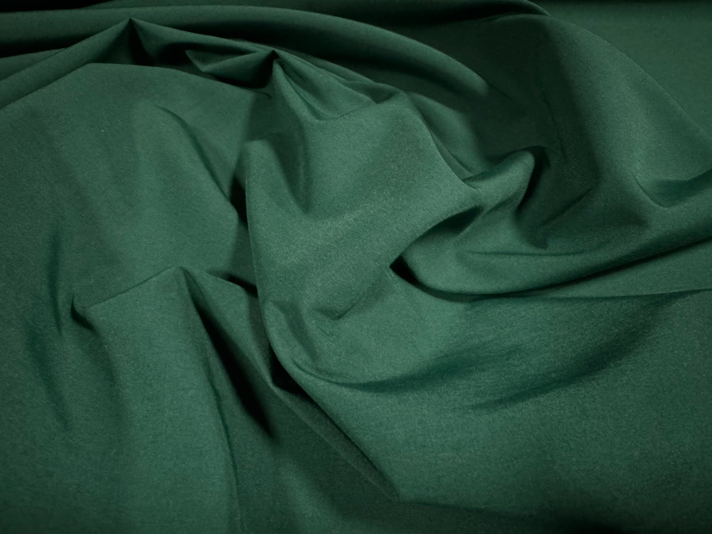 Plain weave trouser weight fabric, per metre - bottle green