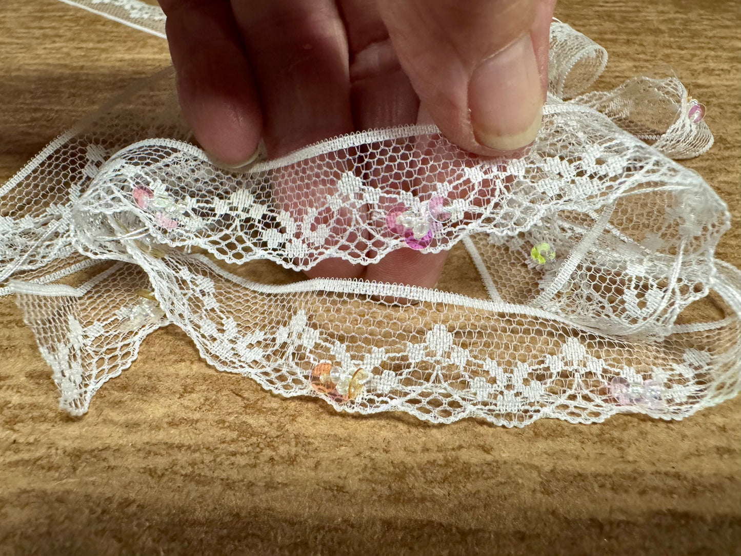 Scalloped lace edging trim fabric - floral - white with lilac sequins