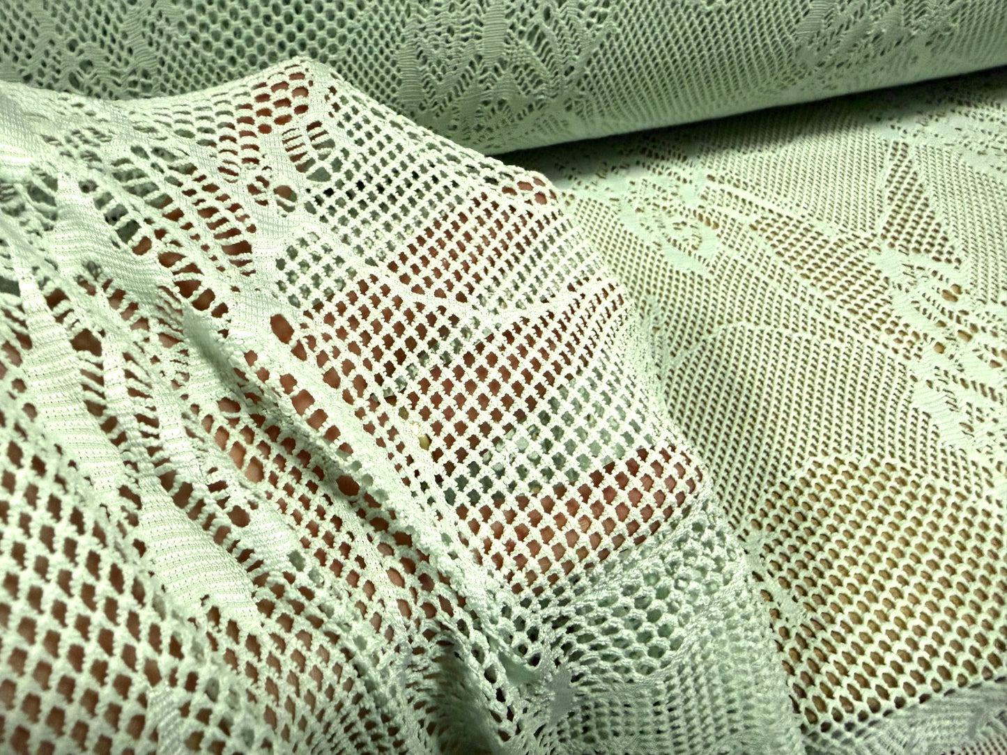 Stretch fishnet jersey fabric with floral design, per metre - mint green