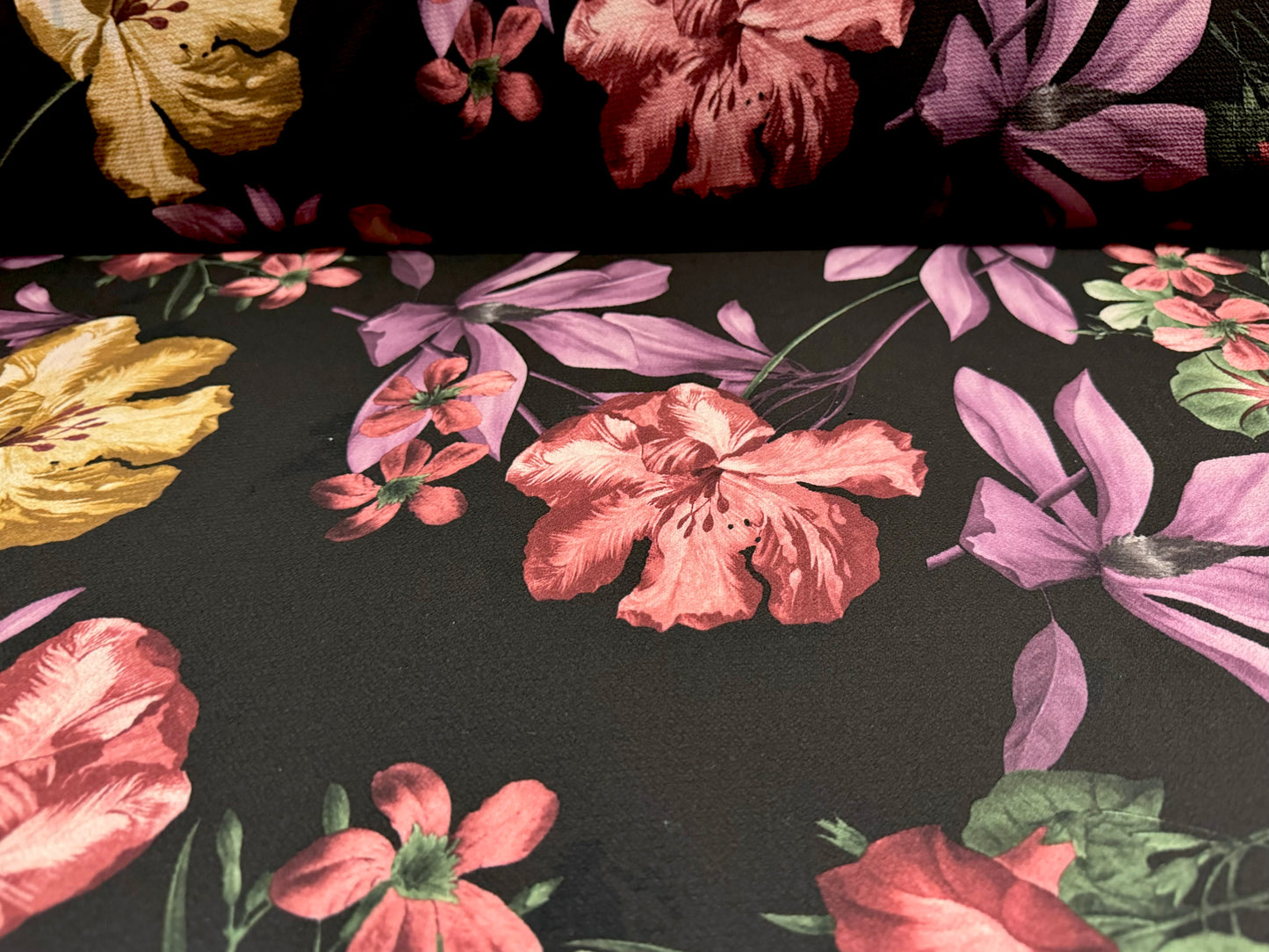 Bubble crepe stretch woven dress fabric, per metre - lilies floral print - black violet & beige