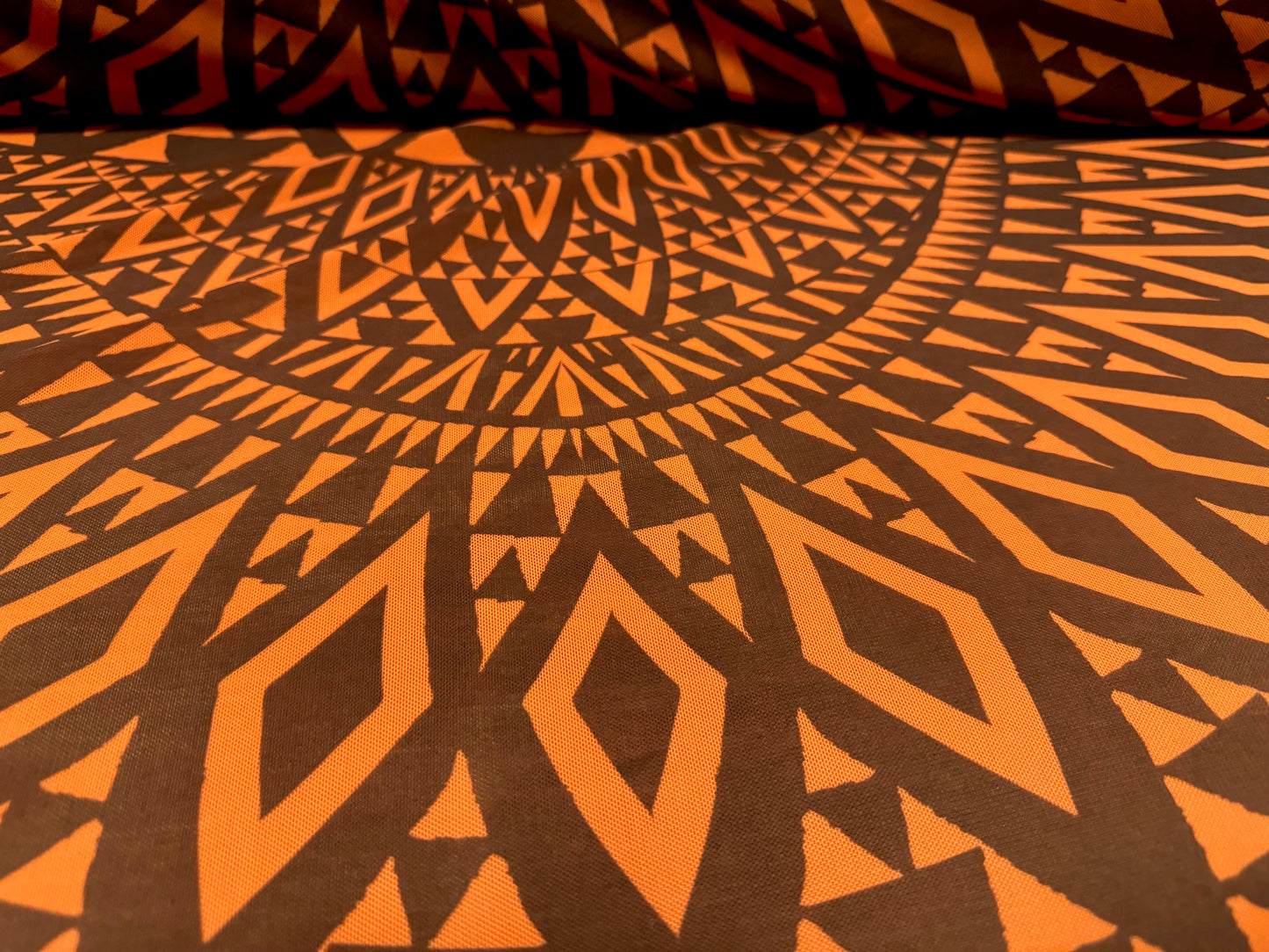 Power mesh net sheer stretch spandex fabric, per metre - tribal tattoo print - orange