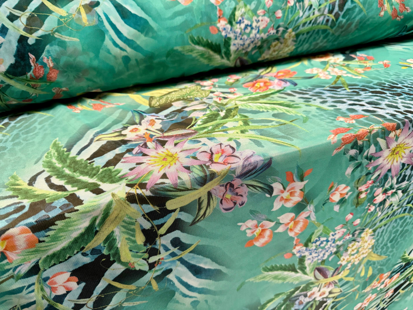 Power mesh net stretch spandex fabric, per metre - jungle flowers & animal print - jade green