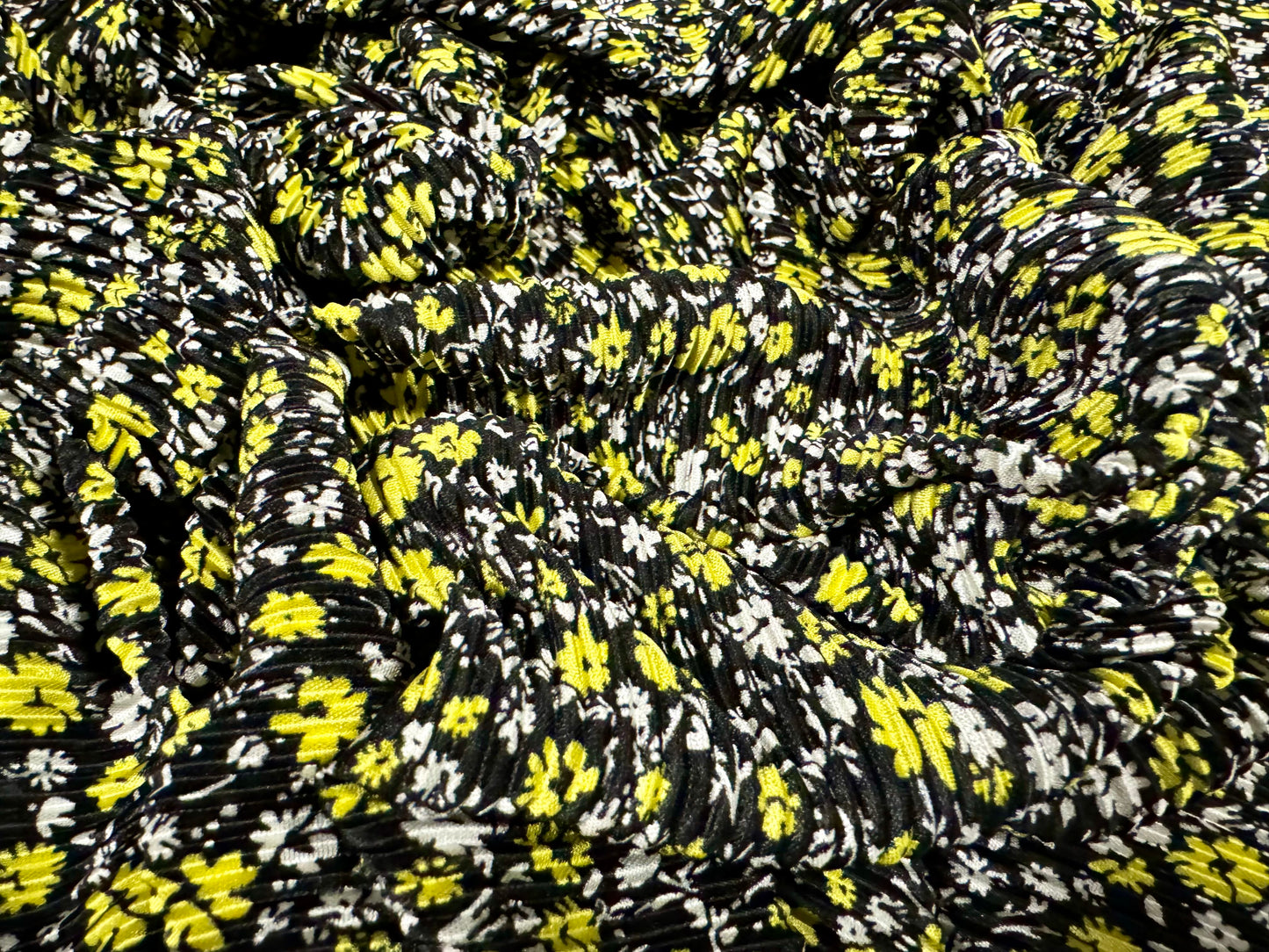 Stretch plissé pleated dress fabric, per metre - ditsy flower print - black & yellow