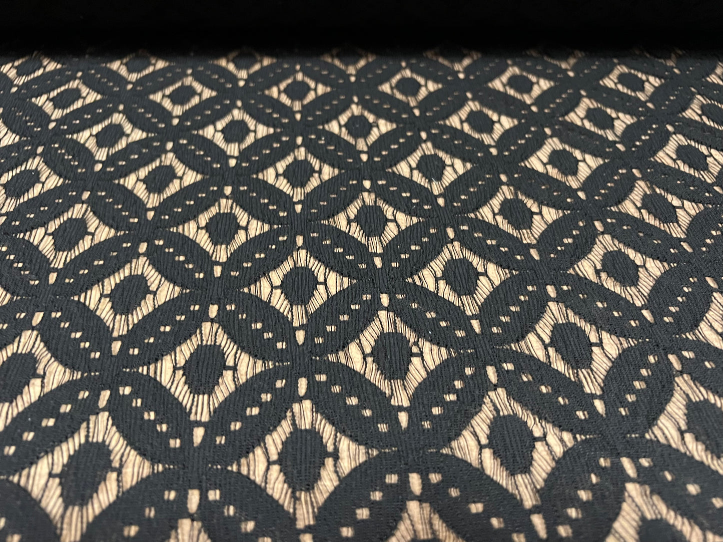 Lace dress fabric, per metre - no stretch - quatrefoil design - black