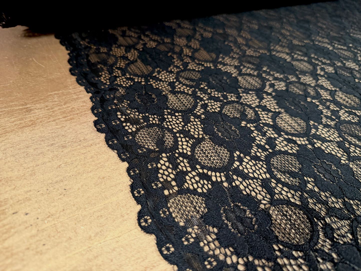 Stretch spandex lace dress fabric with scalloped selvedge, per metre - floral - black