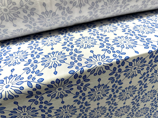 Finely textured stretch spandex single jersey fabric, per metre - stylised flower print - cobalt blue & white