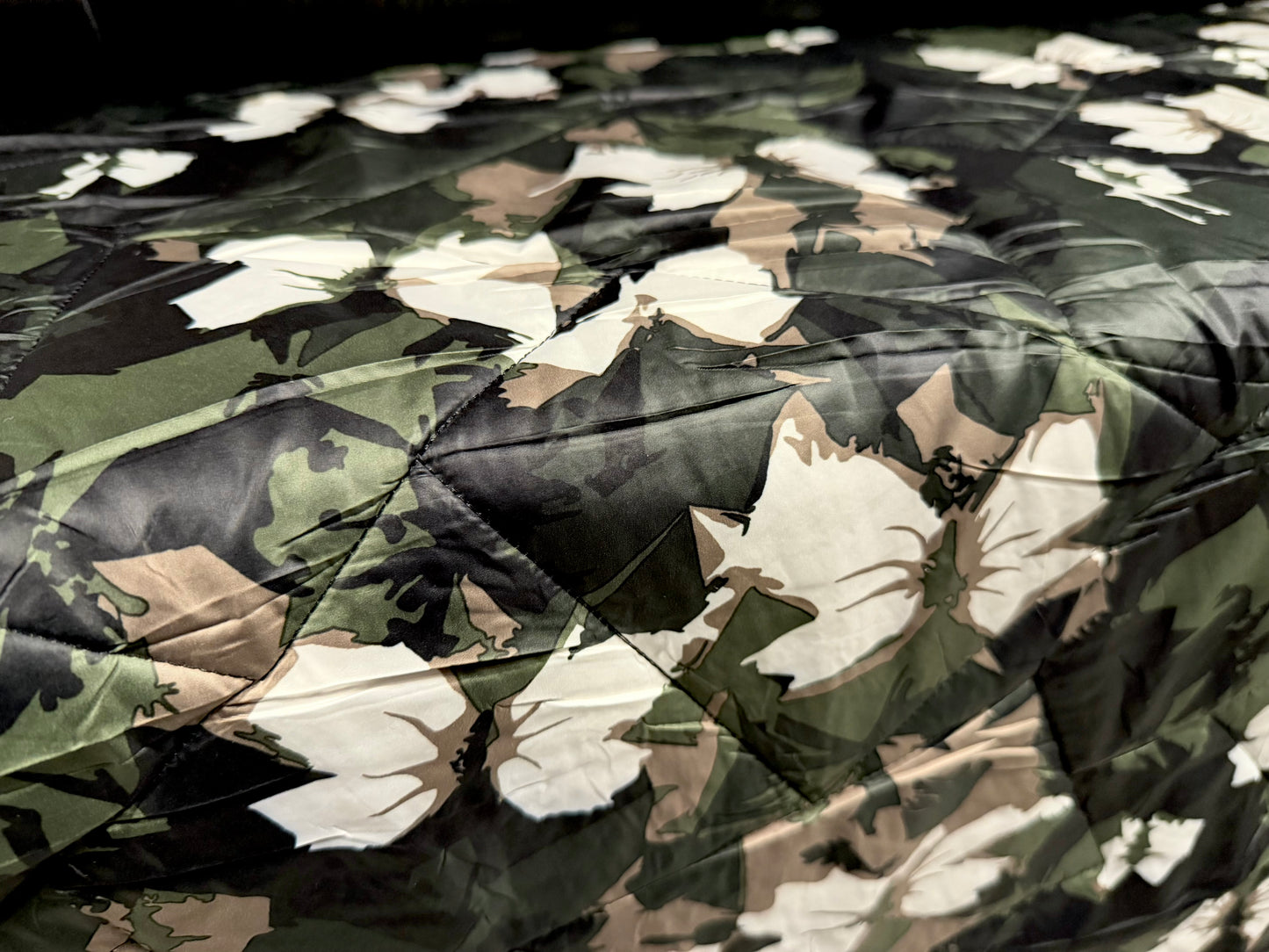 Quilted double sided fabric, per metre - stylised floral print - khaki beige & black