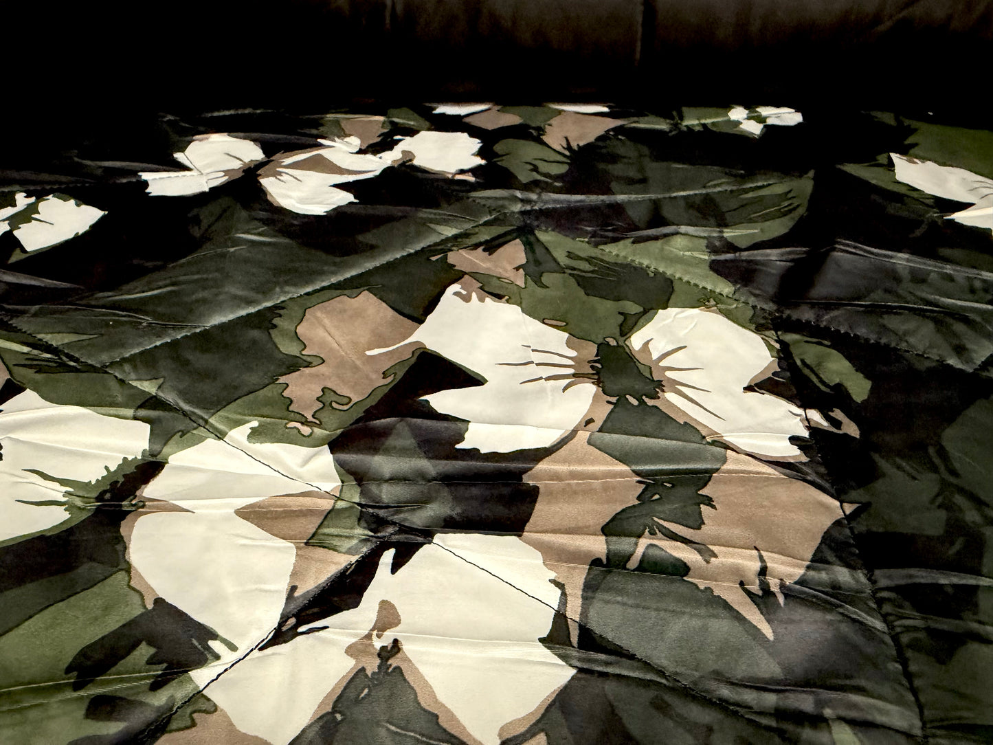 Quilted double sided fabric, per metre - stylised floral print - khaki beige & black