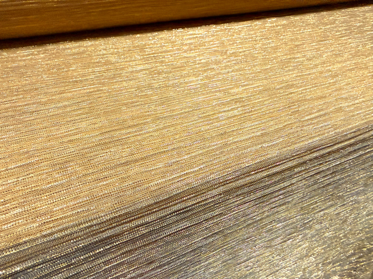 Moonlight shimmer metallic stretch plissé mesh fabric, per metre - gold