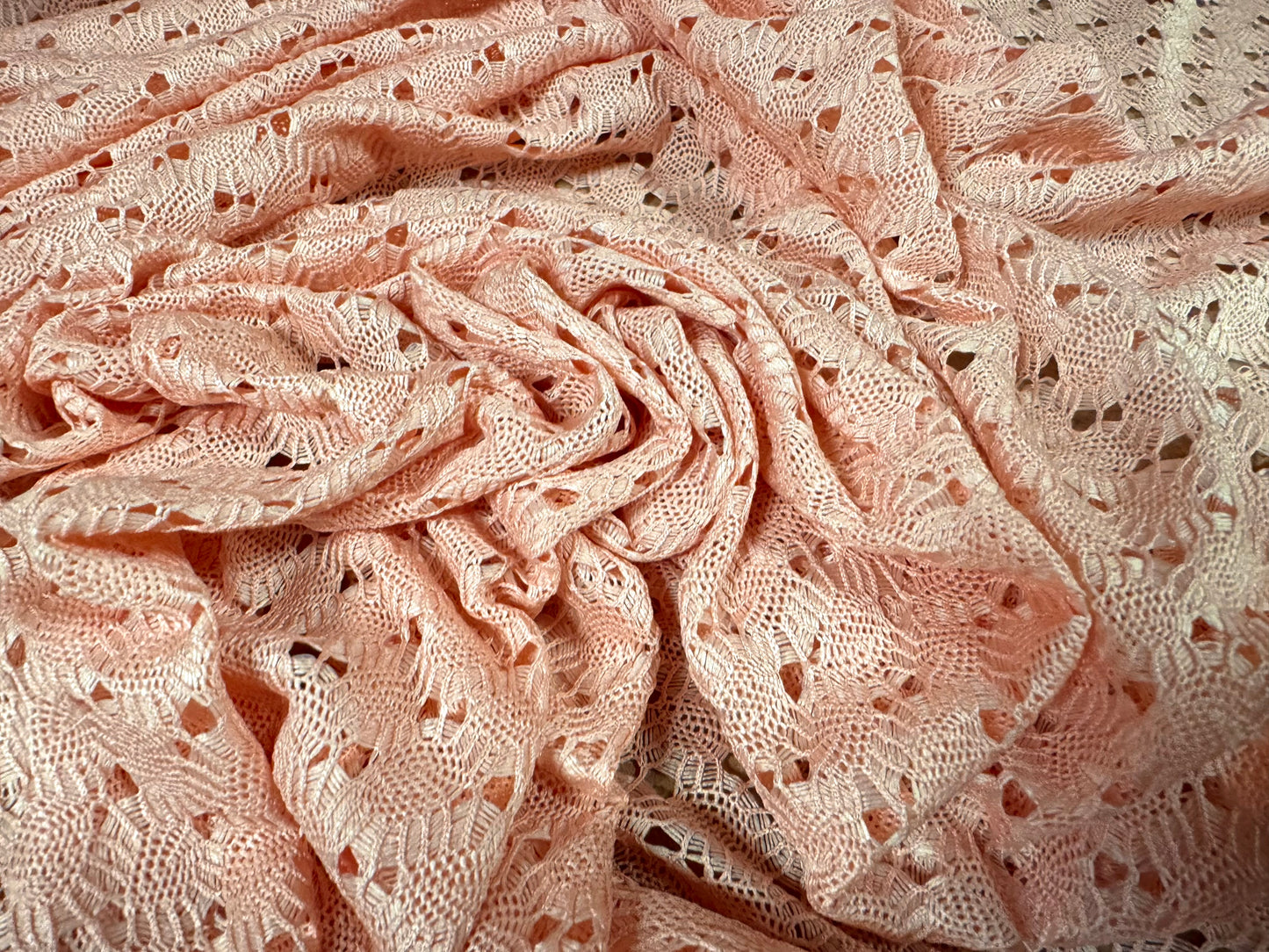 Crochet knit lace dress fabric, per metre - scalloped selvedge - pink