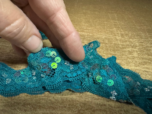 Scalloped lace edging trim fabric with sequins - stretch - Skobeloff green