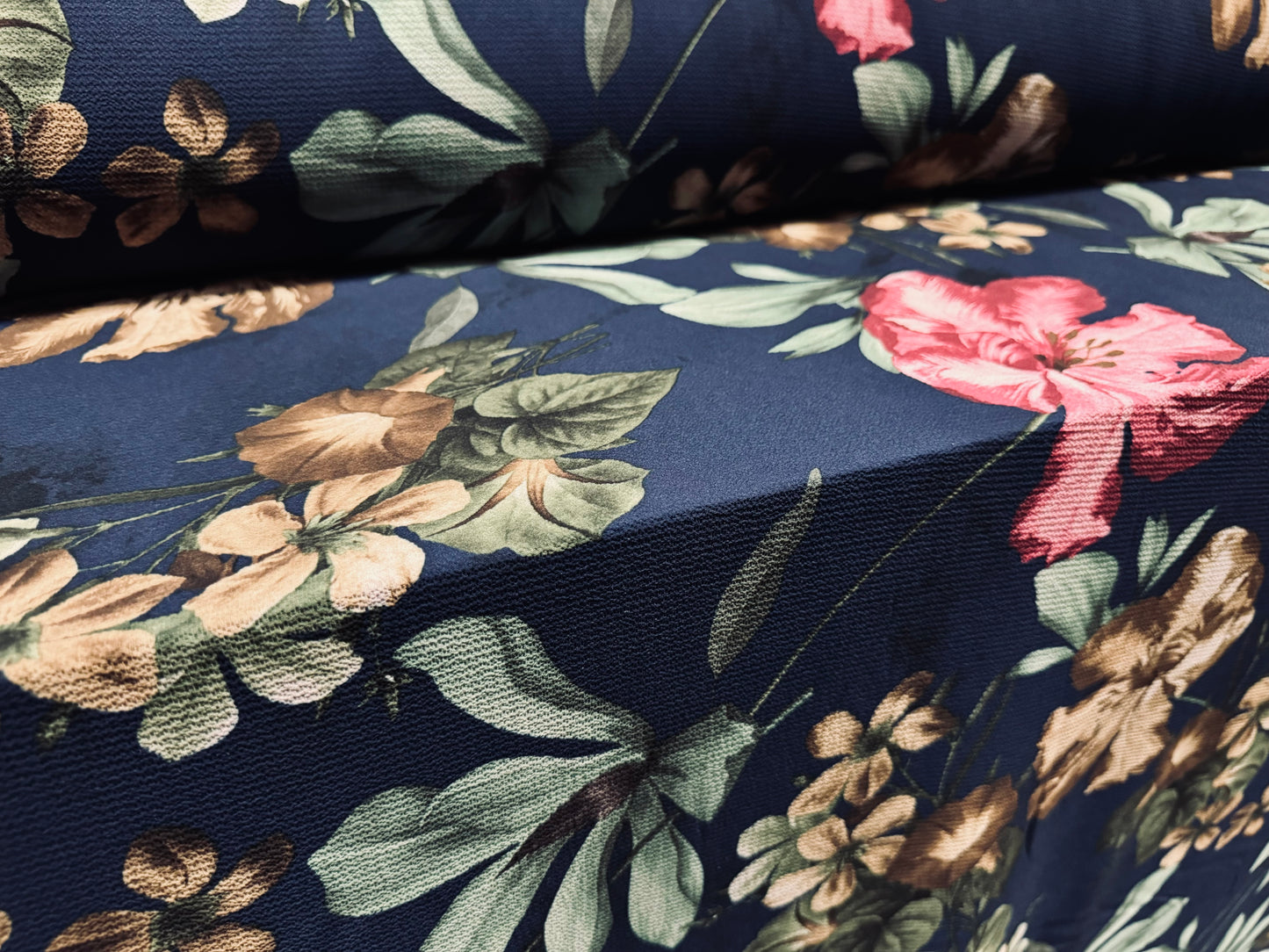 Bubble crepe stretch woven dress fabric, per metre - lily flower print - navy blue pink & beige