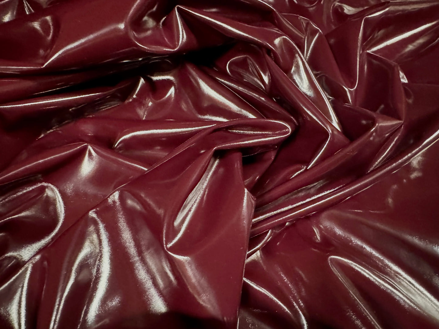 High gloss pvc fabric with comfort stretch, per metre - plain - mulberry