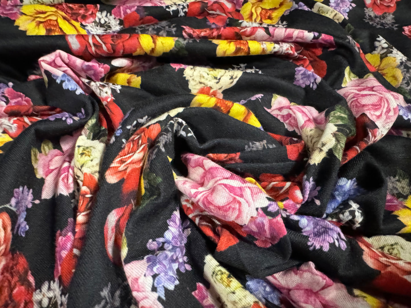 Soft handle single jersey fabric, per metre - roses print - black with multicolour flowers