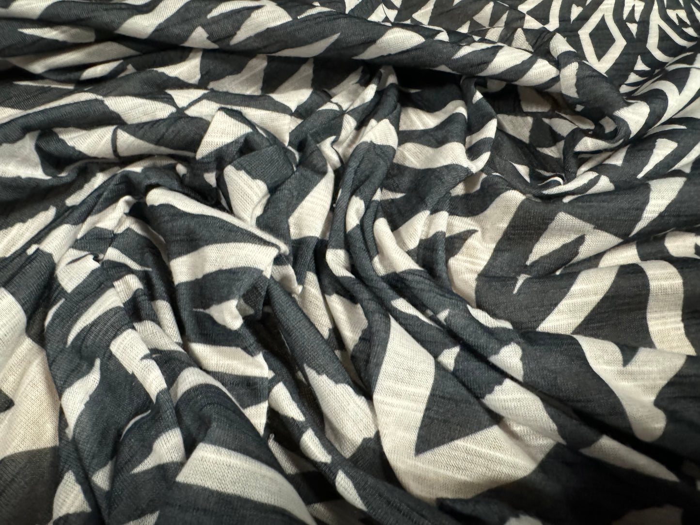 Soft handle single jersey fashion fabric, per metre - tribal tattoo print- ecru & black