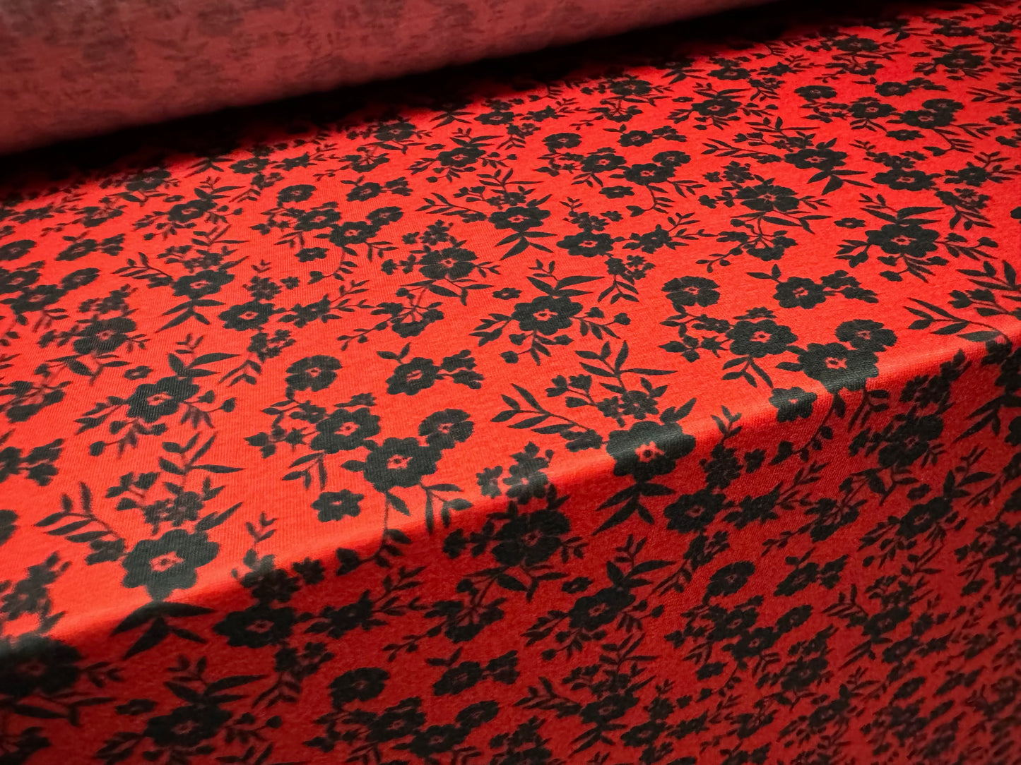 Soft handle stretch single jersey fabric, per metre - ditsy flower print - red & black