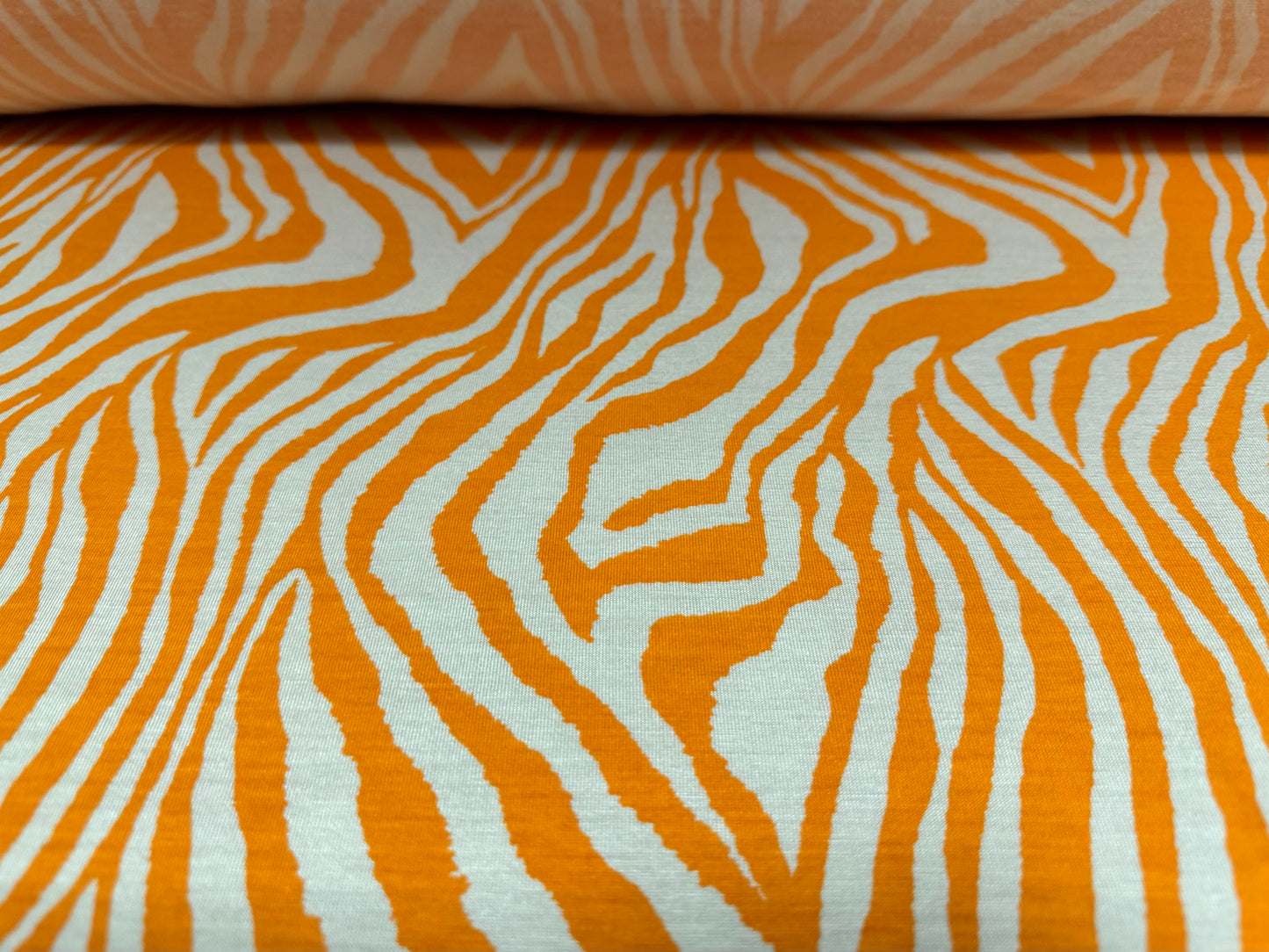 Viscose spandex stretch single jersey fabric, per metre - zebra animal print - orange & white