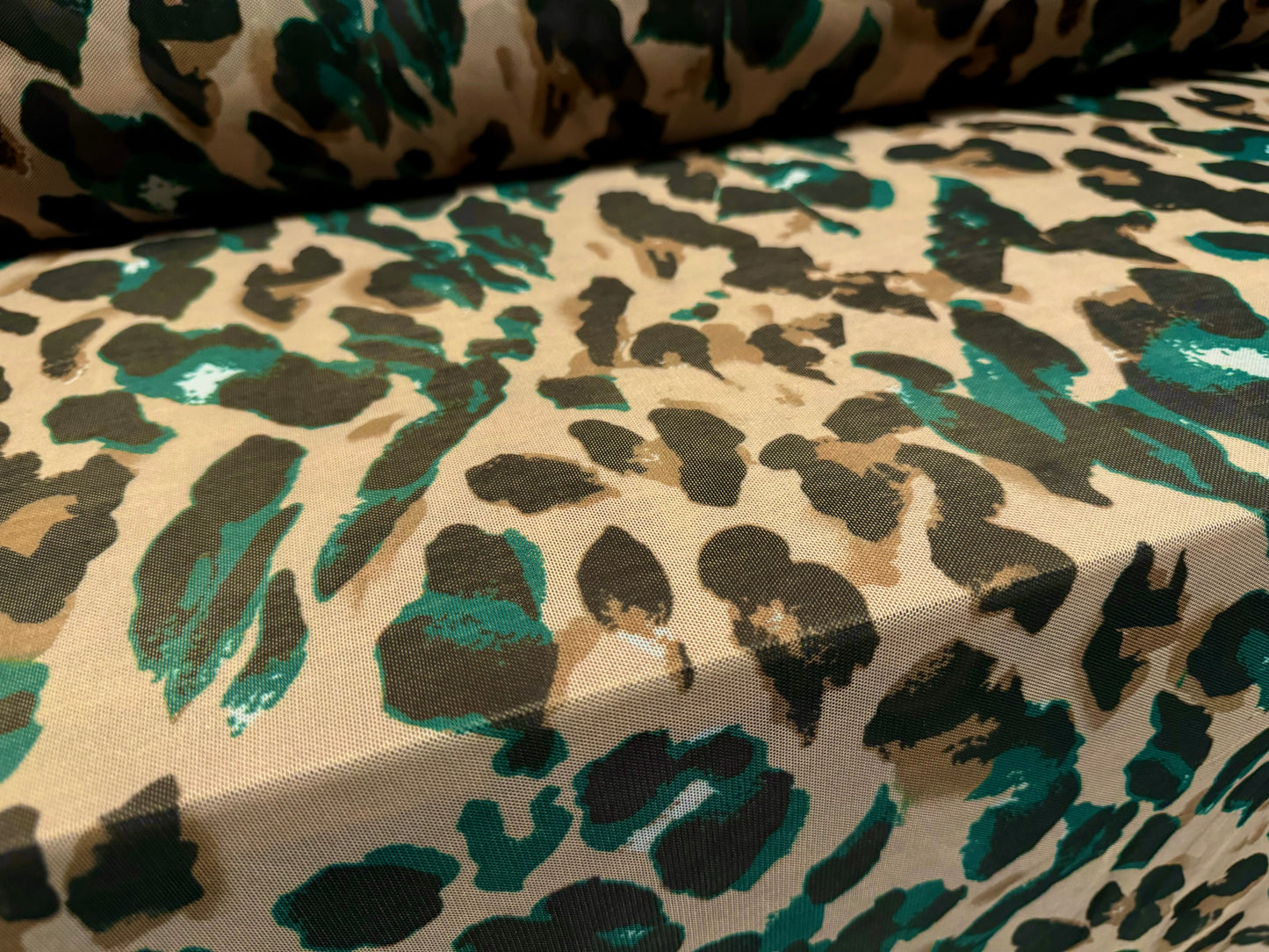 Power mesh net stretch spandex fabric, per metre - stylised cheetah print - sand & emerald green