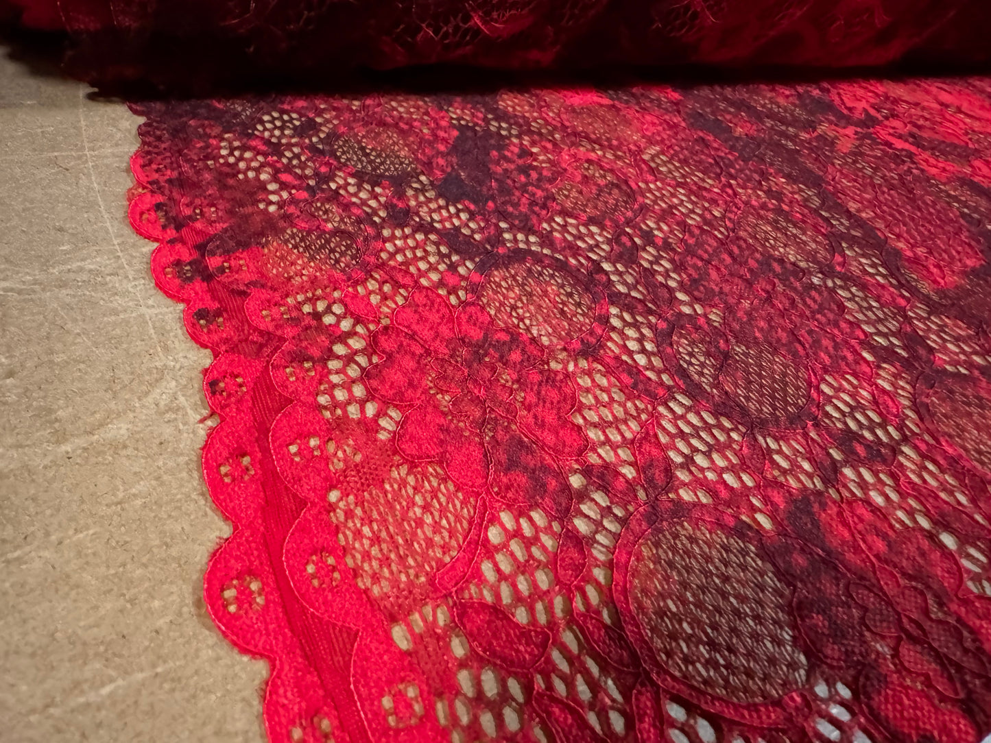 Stretch lace dress fabric with scalloped selvedge, per metre - floral print - red & black