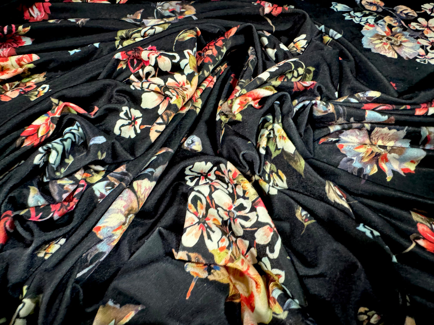 Soft touch stretch spandex single jersey fabric, per metre - flourish print - black with multicolour flowers