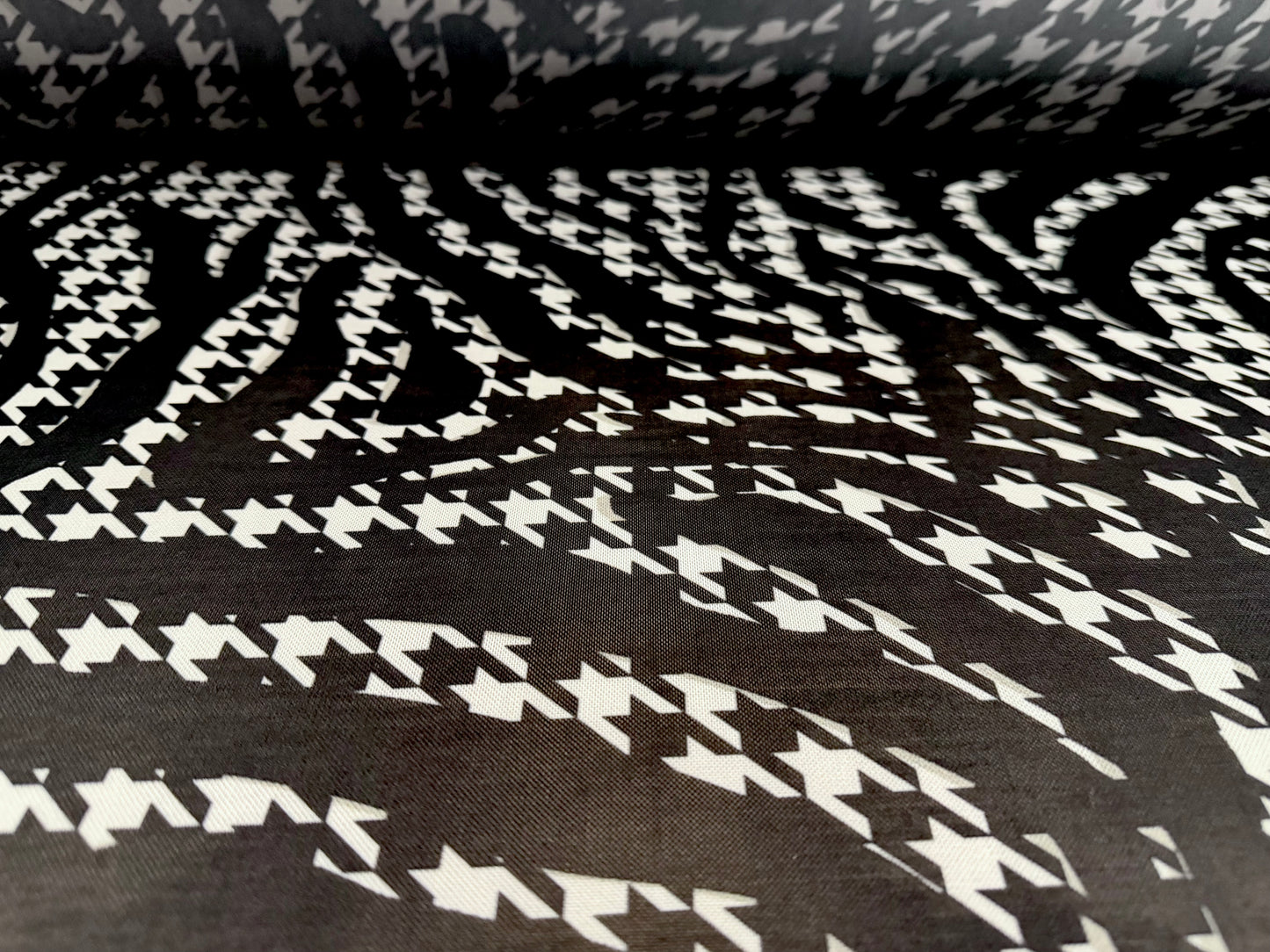 Power mesh net stretch spandex fabric, per metre - houndstooth swirl print - black & white