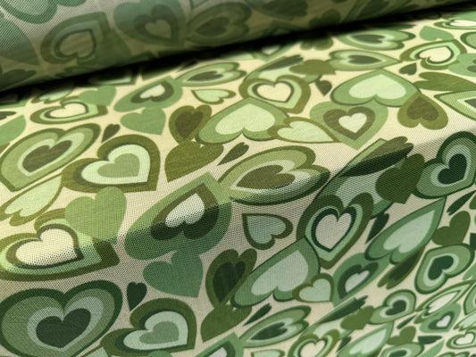 Power mesh net stretch spandex fabric, per metre - love hearts print - sage green