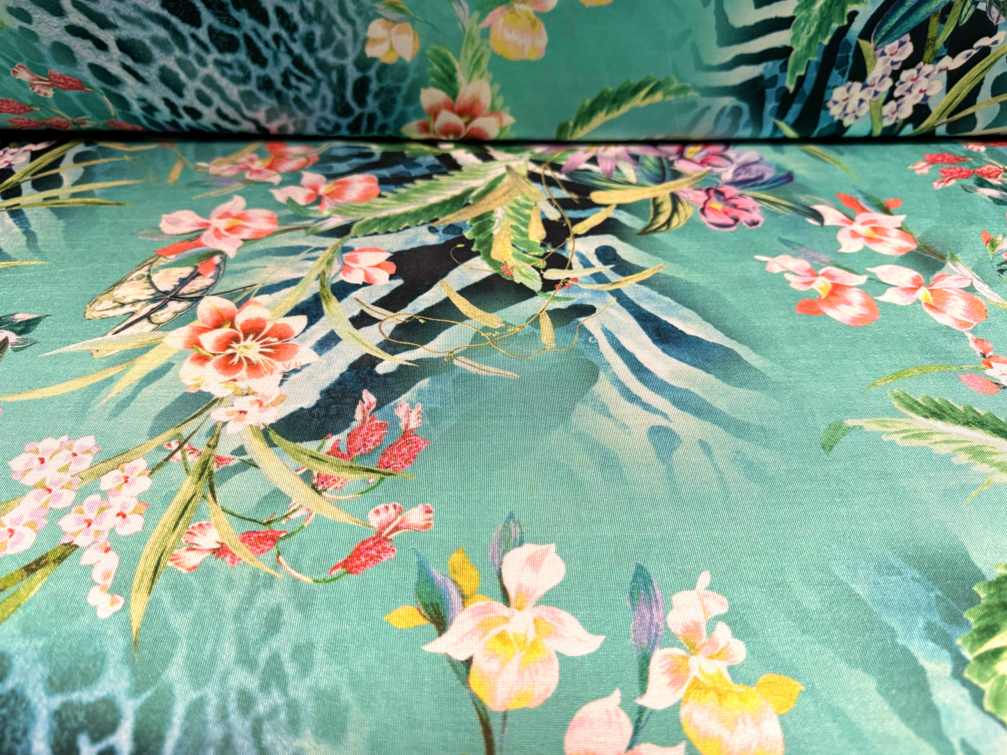 Disco stretch single jersey fabric, per metre - jungle flowers & animal print - turquoise green