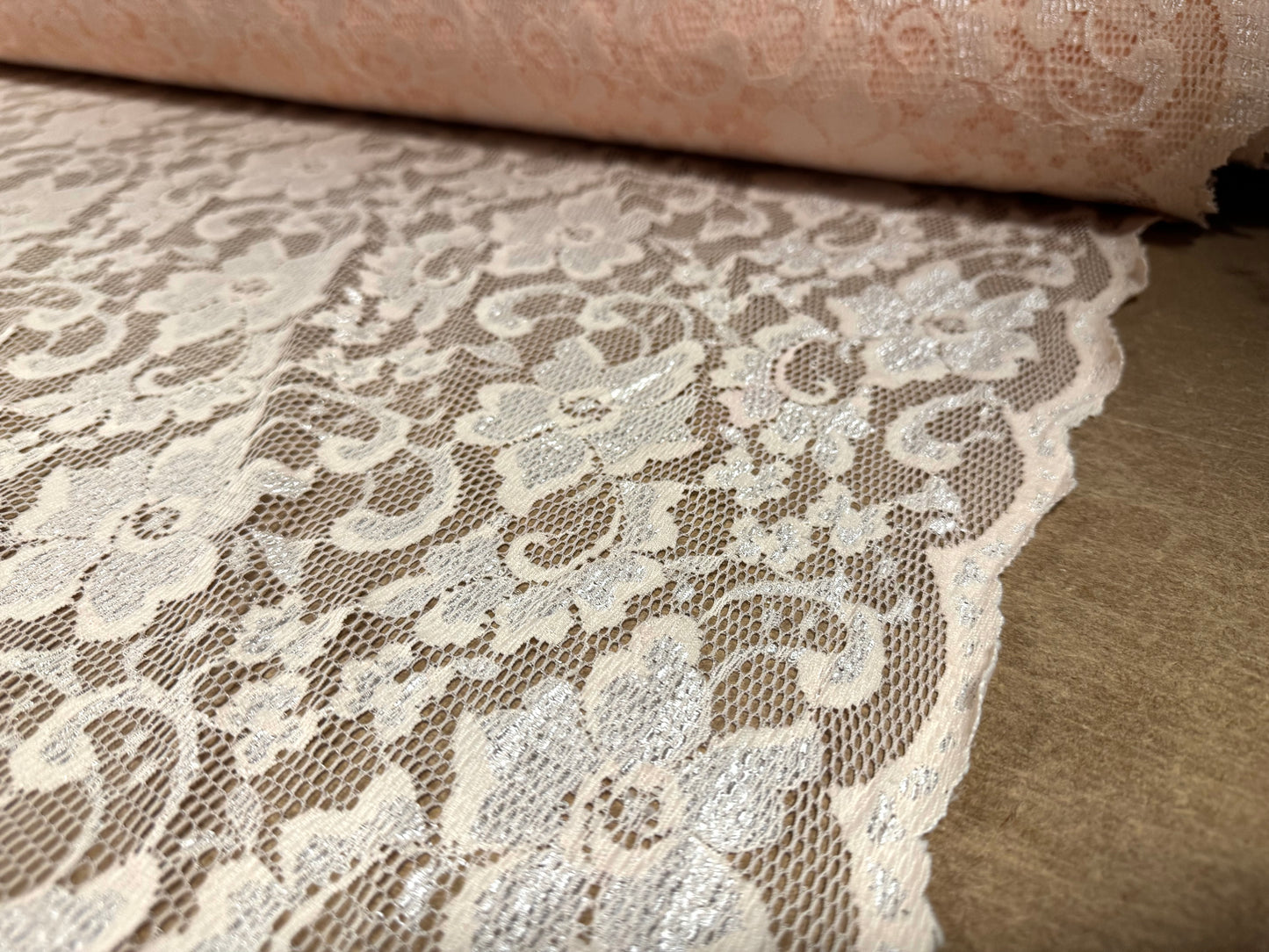 Stretch spandex lace dress fabric with scalloped selvedge, per metre - floral - skin tone