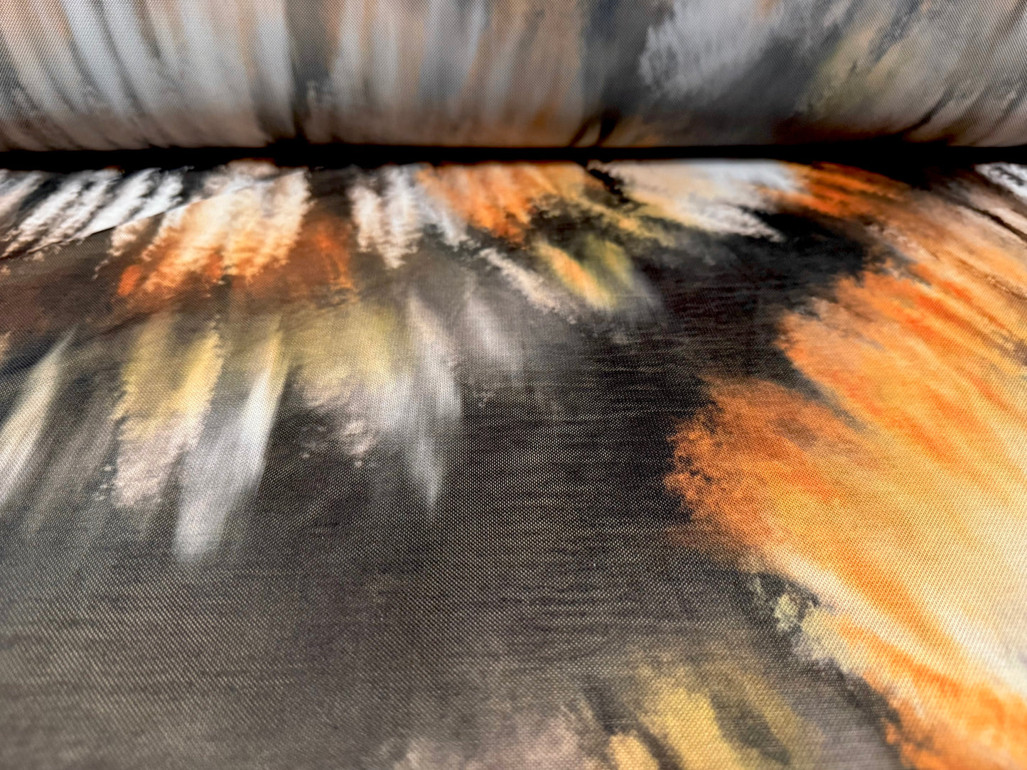 Power mesh net stretch spandex fabric, per metre - tie dye streak print - black orange and cream