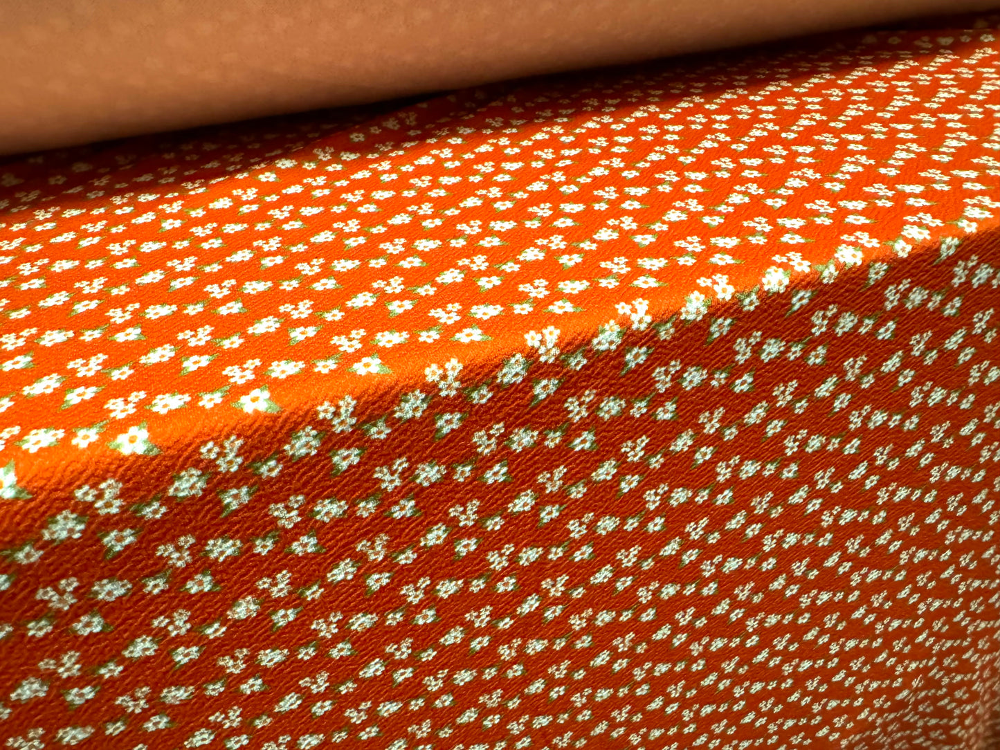 Waterfall textured scuba stretch spandex jersey fabric, per metre - ditsy flower print - orange