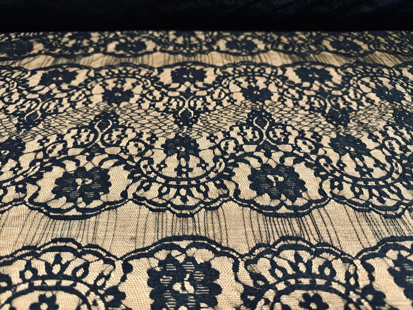 Fine mesh lace fabric, per metre - floral design with scalloped frill - black