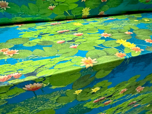 Soft touch stretch spandex single jersey fabric, per metre - water lily print - blue & green