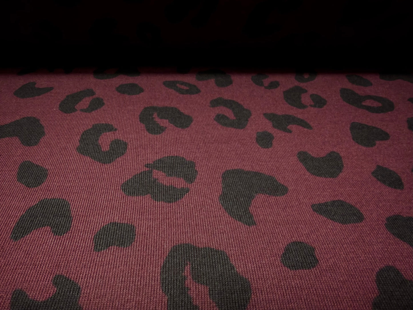 Lightweight jersey knitwear fabric, per metre - cheetah animal print - dark plum