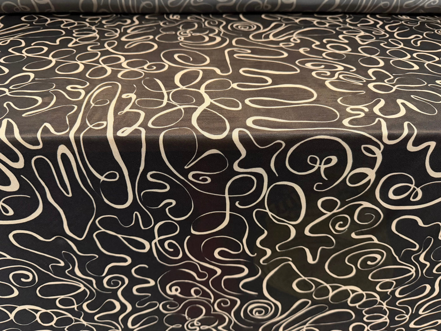 Power mesh net stretch spandex fabric, per metre - doodle print - black & stone